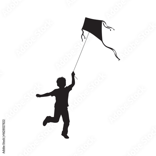 Joyful child running and flying a kite in a striking black silhouette