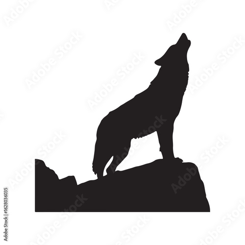 Majestic wolf howling at the moon on a rocky outcrop silhouette