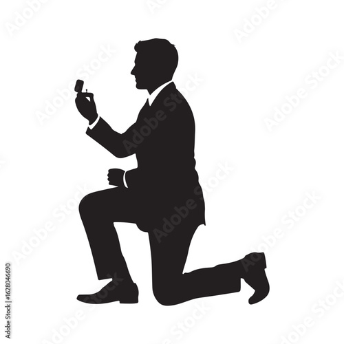 Man in suit kneeling proposing with ring silhouette