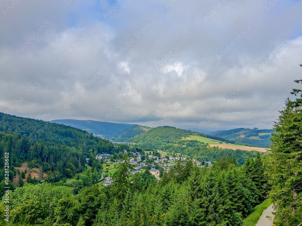 Fototapeta premium spring landscape with green hills and clouds