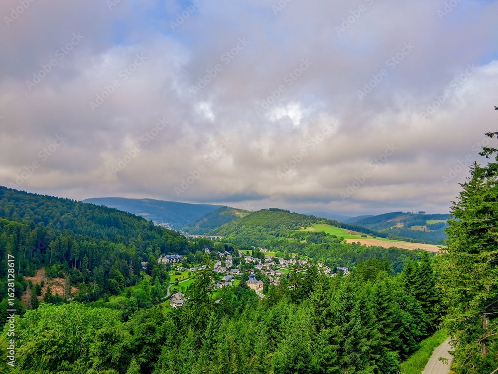 Obraz premium summer landscape with green hills and clouds