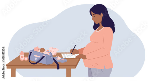 Pregnant woman filling out paperwork next to baby bag and clothes baby clothes