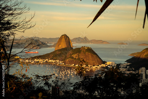 Rio de Janeiro, RJ, Brazil, 08/03/2025 - Sugar Loaf and Urca hills and Botafogo cove at sunset, seen from the Dona Marta viewpoint