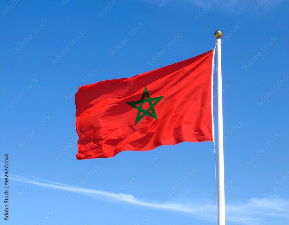 custom made wallpaper toronto digitalMoroccan flag waving proudly in a clear blue sky.