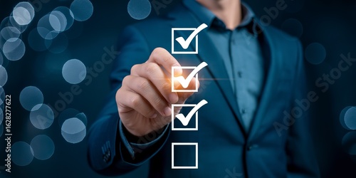 Businessman marking a checklist with a pen on a dark background with bokeh lights