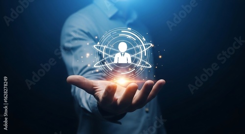 Wallpaper Mural Male hand holding holographic human icon, futuristic HR technology concept visual for digital workforce branding Torontodigital.ca