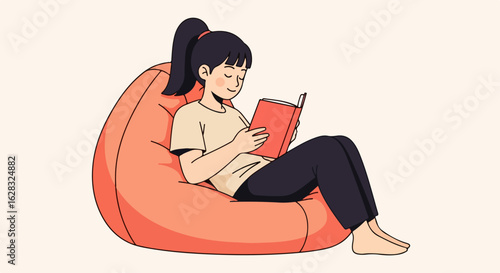 Relaxed young woman with a ponytail reading a book while sitting comfortably on a large orange beanbag chair.
