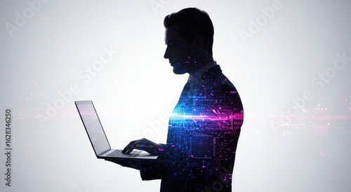 Silhouette of a man using a laptop with digital data overlay