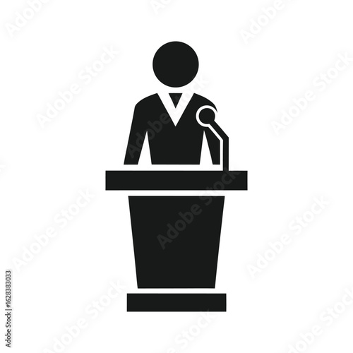 Black silhouette icon of a person speaking at a podium with a microphone speech speaker