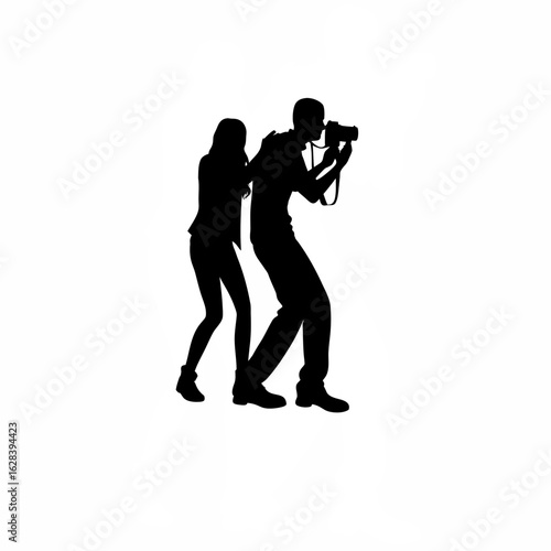 Couple taking turns using a camera to capture memories
