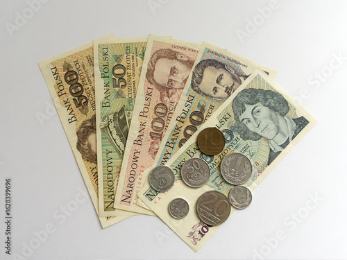 Old polish money, banknotes and coins  from 80s, 90s. on white background. Polish zloty