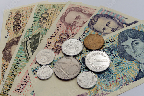 Old polish money, banknotes and coins  from 80s, 90s. on white background. Polish zloty