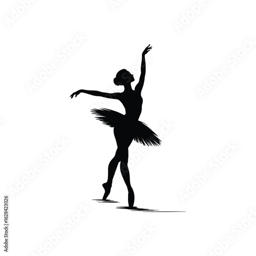 Silhouette of a graceful ballerina performing a ballet pose on pointe shoes