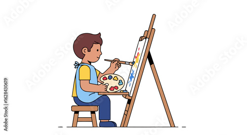 young artist painting on easel creative child at work