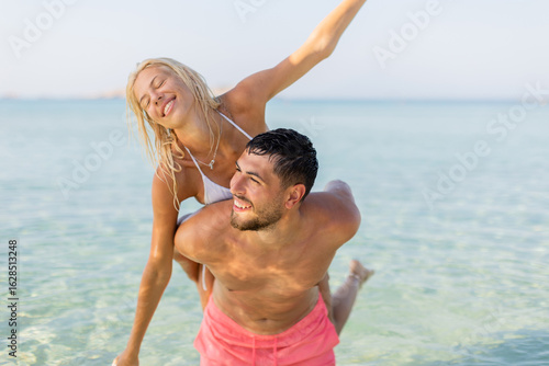 Joyful couple enjoying a su...