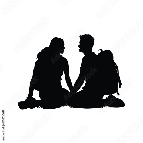 Silhouette of a couple holding hands outdoors with backpacks, enjoying nature