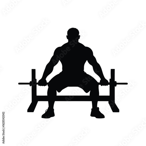 Silhouette of bodybuilder preparing for barbell bench press in a gym