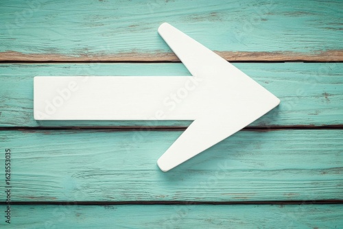 Arrow Guides on Rustic Wood Direction and Guidance Conceptual Theme.