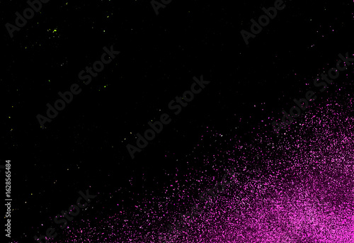 Abstract pink explosion of confetti on a black background. Design element