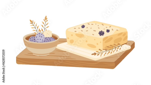 Still life of a bowl of blueberries and a block of cheese on a wooden cutting board with foliage
