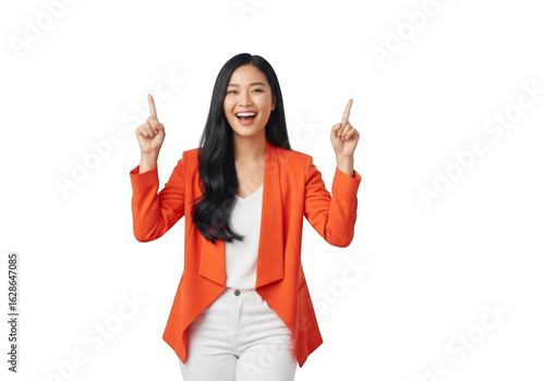 Happy asian woman in orange blazer and white pants pointing up with index fingers, isolated on transparent background