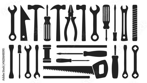 Collection of silhouetted hand tools wrench hammer
