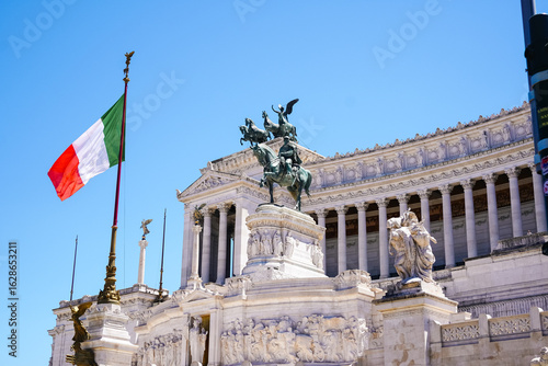 Photography The Italian flag in front of the Victor Emmanuel II National Monument ( Il Monum