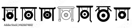 Different styles of gongs and gong stands as vector graphics in black