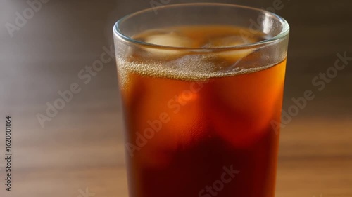 Wallpaper Mural Iced tea, ice cubes, glass, drink, summer, refreshment, cold, ice-cold, tea, drink, thirst quencher, pouring iced tea, slow motion, close-up, ice, drops, liquid, sparkling, cool, delicious, fresh, ser Torontodigital.ca