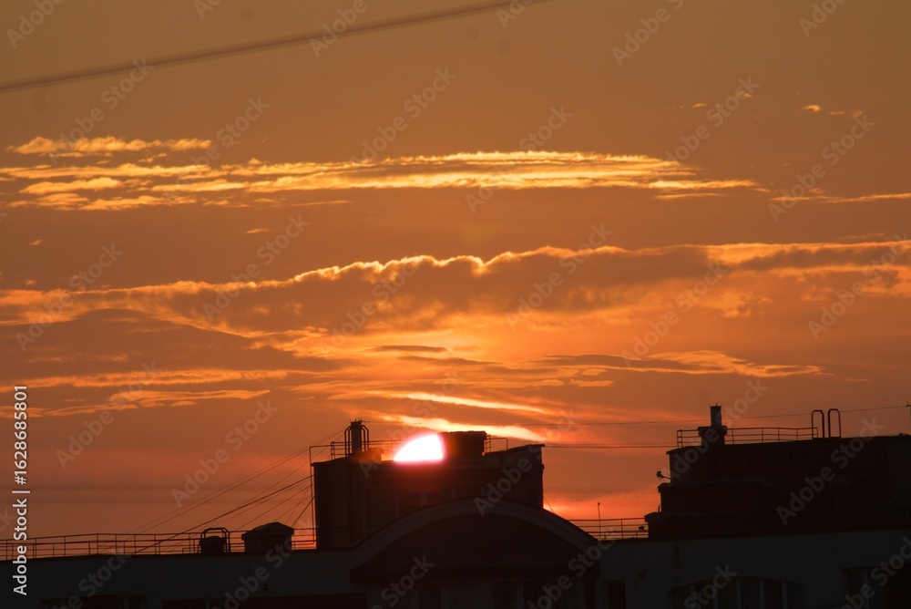 Obraz premium sunset over the city
