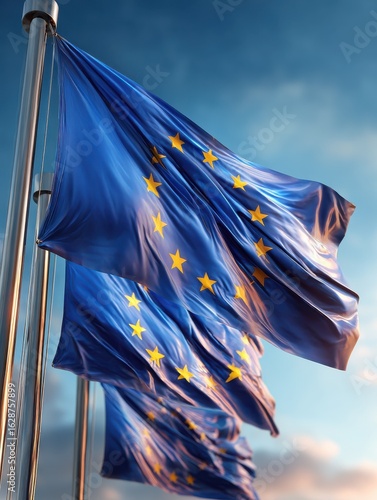 european flags waving against blue sky in the morning © Johannes