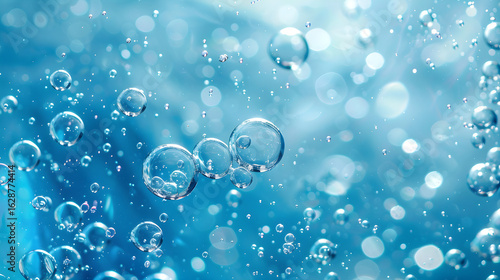 Wallpaper Mural Underwater air bubbles in clear blue water with soft bokeh. Fresh, sparkling texture symbolizing purity, hydration and wellness. Abstract background for design. Torontodigital.ca