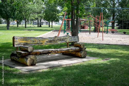 Rustic Log bench at playground
