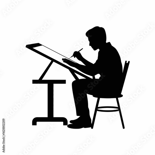 Silhouette of a Designer Working at a Drafting Table