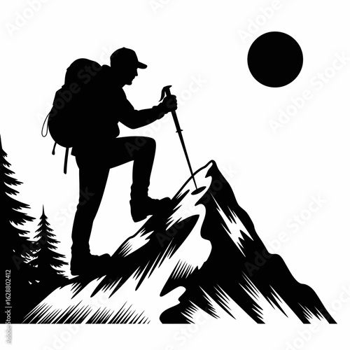 Silhouette of a Mountain Climber on Summit