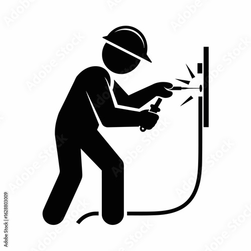 Worker Using Tools for Electrical Installation