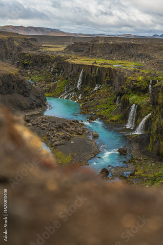 Hraunfossar Waterfalls Flowing Through Lava Fields in Iceland