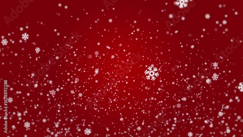 Beautiful snowflakes gently falling on a vibrant red background during the holiday season