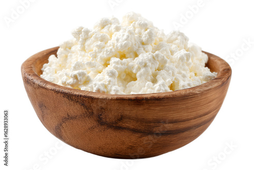 Wallpaper Mural Fresh cottage cheese served in a rustic wooden bowl, showcasing soft, creamy texture and healthy dairy goodness, ideal for nutrition, cooking, and organic food concepts, isolated on white background.
 Torontodigital.ca