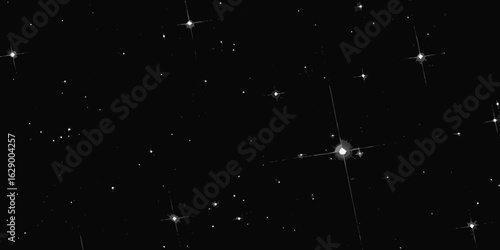 Sparkling stars against a deep black night sky