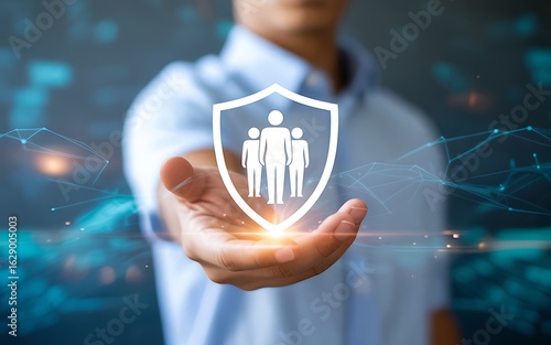 Businessman holding a protective shield icon for group security. Concept of employee safety, insurance, customer care, and data privacy.