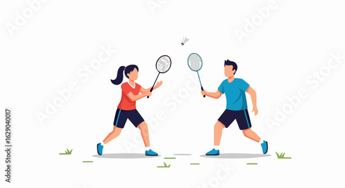 Active man and woman playing badminton outdoors enjoying a friendly match with rackets and shuttlecock.
