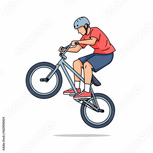 Dynamic BMX rider performs thrilling wheelie trick with skill and agility, capturing extreme sports excitement.
