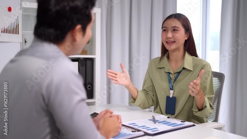 Wallpaper Mural Asian adult businesswoman stretching home office desk laptop tired worker break modern workspace remote professional stress relief Torontodigital.ca