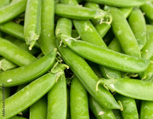 Fresh Green Snap Peas on Isolated Background