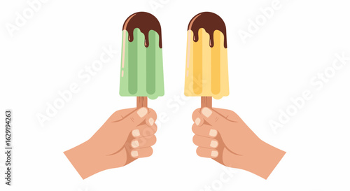 Two hands hold colorful green and yellow popsicles with dripping chocolate topping.