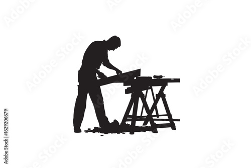 Silhouette of a carpenter working with a saw on a workbench illustrating craftsmanship and manual labor in a workshop setting