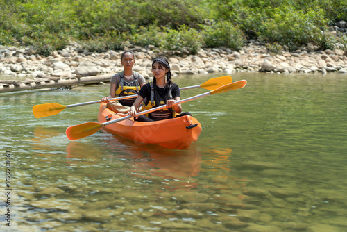 Wallpaper Mural Asian Women Canoeing on Oyo River in Yogyakarta Nature Escape Torontodigital.ca