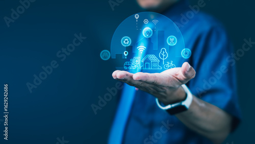 Businessman holding smart city digital sphere for sustainable innovation and connected ecosystem infrastructure technology