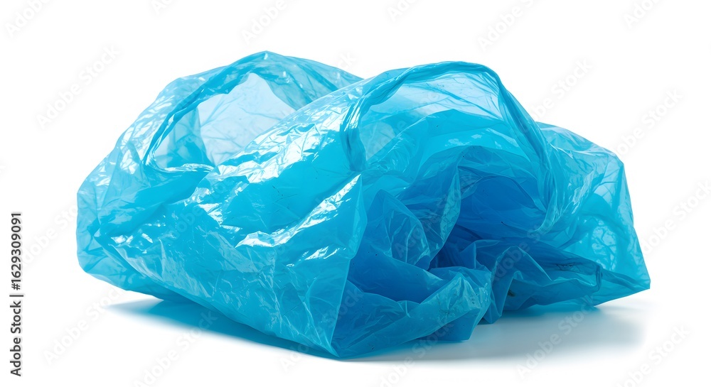 Fototapeta premium Close-up studio shot of a crumpled light blue plastic bag against a white background, showing its texture and translucent material with a cool, clean aesthetic.